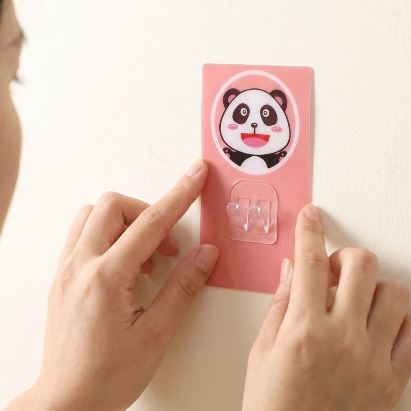 wall-hook_4_-3_a4e97fdd-8e18-4815-87f9-21122fd940e8.jpg Cartoon Adhesive Wall Hook � Strong Hold & No Drilling required