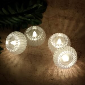 01_061e8d82-8fba-4ced-85cd-8b05a42e21e8.jpg LED Flameless Decorative Candles – Set of 4 Crystal-Style Tealights