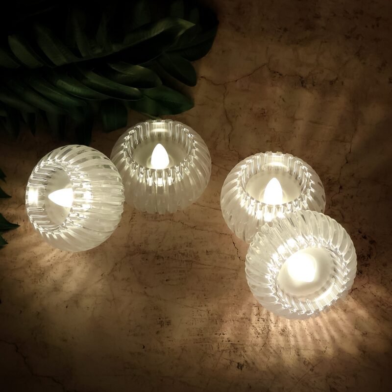 01_061e8d82-8fba-4ced-85cd-8b05a42e21e8.jpg LED Flameless Decorative Candles – Set of 4 Crystal-Style Tealights