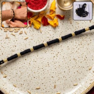 01_40d58cba-6b4a-4b15-bbf3-1ab30fe18254.jpg Rakhi � Handmade Black Thread with Gold Beads for Raksha Bandhan