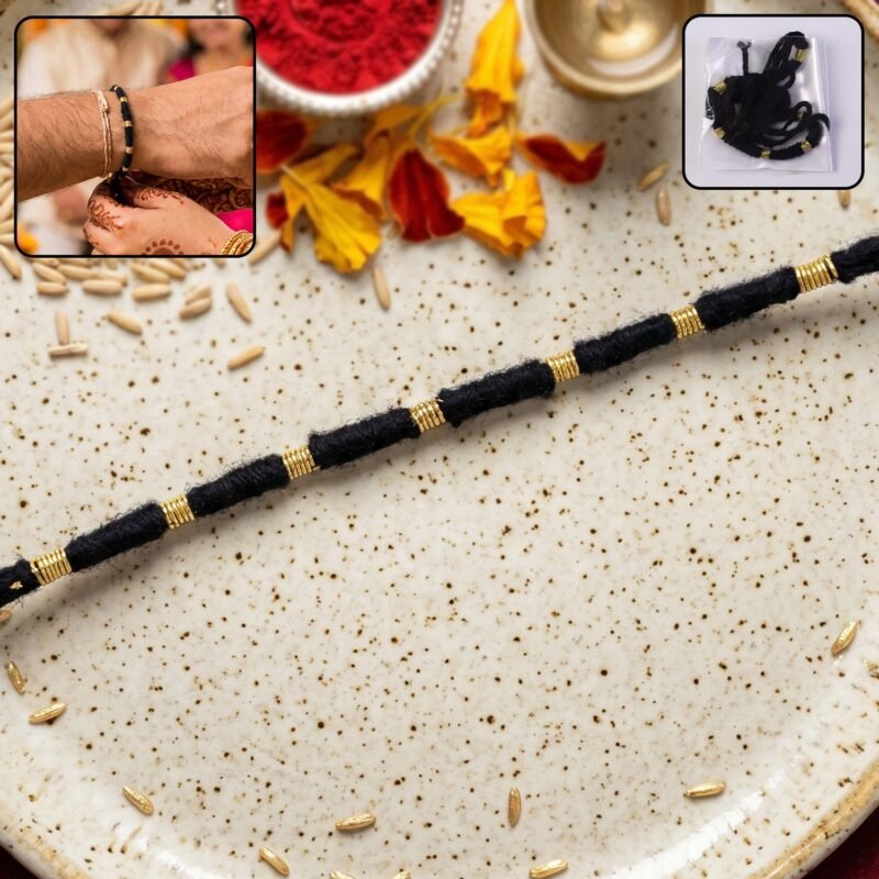 01_40d58cba-6b4a-4b15-bbf3-1ab30fe18254.jpg Rakhi � Handmade Black Thread with Gold Beads for Raksha Bandhan