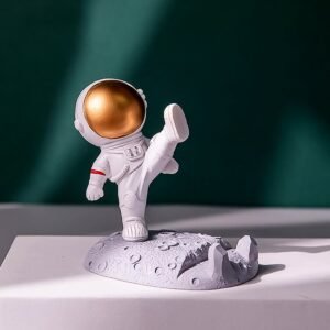 01_8d5c4877-a713-4aef-b859-ac071f6bf21d.jpg Astronaut Phone Holder � 3D Spaceman Design, Resin | PHOBIA