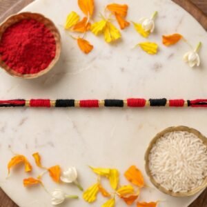 Handmade Rakhi � Traditional Beaded Thread with Golden Accents