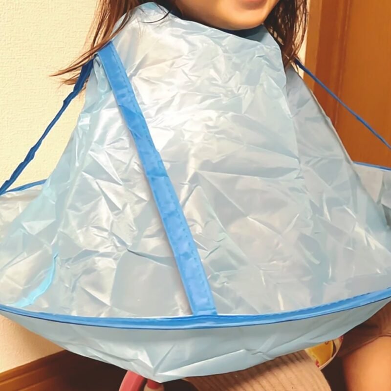 02_76761e92-6bb2-4e2e-a6a3-16e30fd20259.jpg Reusable Hair Cutting Cape � Mess-Free Home & Salon Use