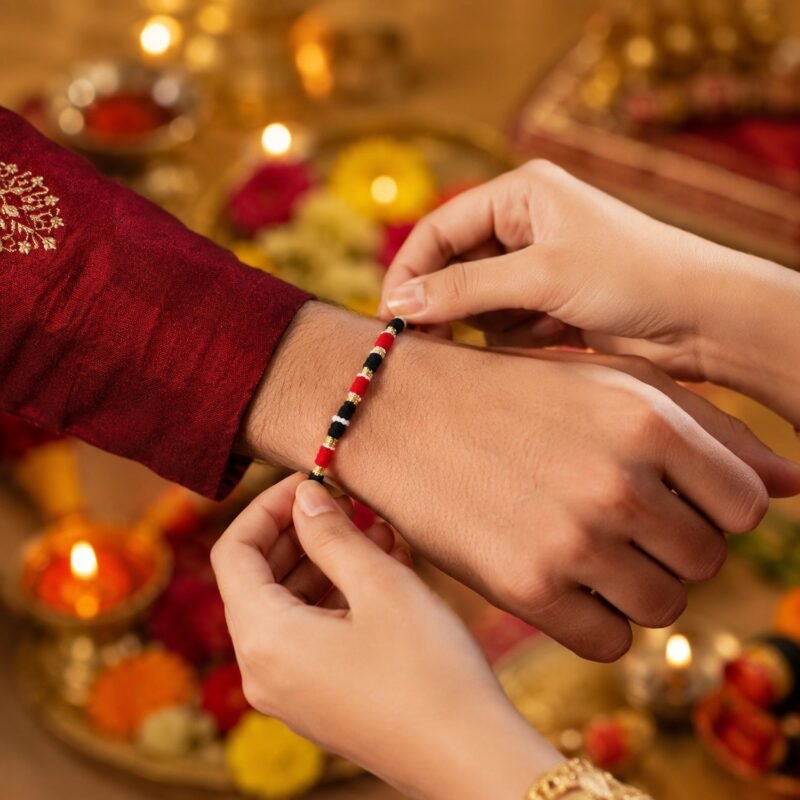 03_696de7fd-f0ee-4203-baf2-d5e0f0e91a39.jpg Rakhi � Traditional Beaded Thread for Raksha Bandhan