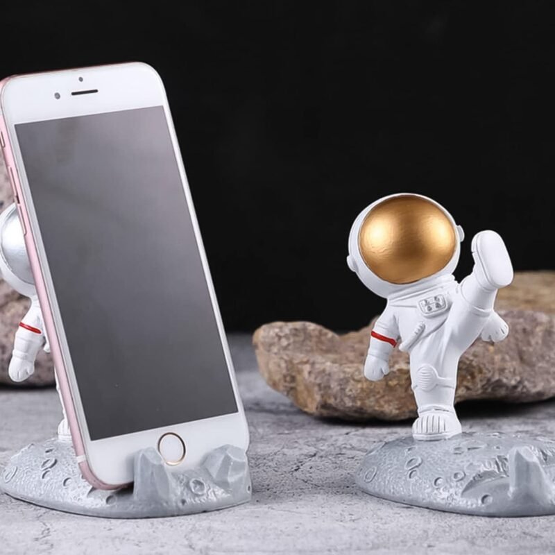 04_ea05c3a8-8963-4dfc-bafe-25762217c00b.jpg Astronaut Phone Holder � 3D Spaceman Design, Resin | PHOBIA