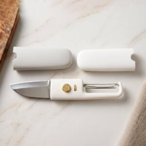 2-in-1StainlessSteelKnife_Peeler-06_e44d77b7-06e8-4f52-b300-78a9329d8350.jpg Multifunctional Peeler – 2-in-1 Knife & Sawtooth for Kitchen | ChefAura
