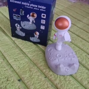 43c2bd7b-35ec-4394-babc-a1ea4f3cb837.jpg Astronaut Phone Holder � 3D Spaceman Design, Resin | PHOBIA