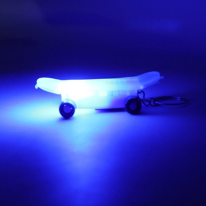 FlashlightKeychain-02.jpg Mini Skateboard LED Keychain � Light-Up Fun Accessory for Keys and Bags
