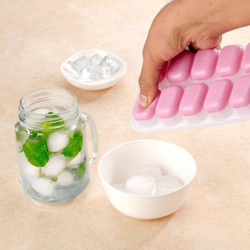 PinkIceCubeTrays-05.jpg Plastic Ice Cube Tray � Durable with Lid for Easy Freezing