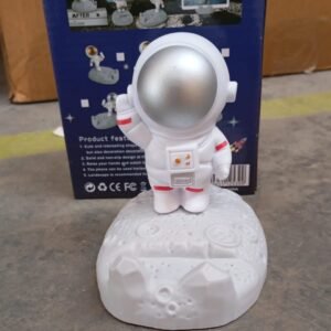 f78a394d-a248-4777-9b66-5a59eff52262.jpg Astronaut Phone Holder � 3D Spaceman Design, Resin | PHOBIA