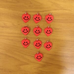 keychain6_d9904e32-ff56-450e-97c3-b5edb67c4c26.jpg Heart-Shaped Smile Keychains – Vibrant & Durable Accessory Set